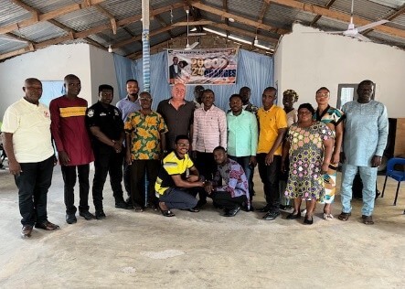 Group photo of people gathered inside a church